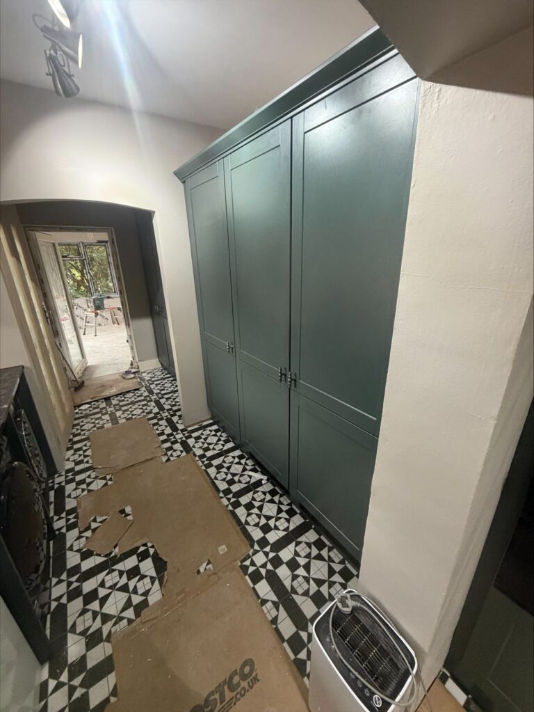 Fitted cupboards green